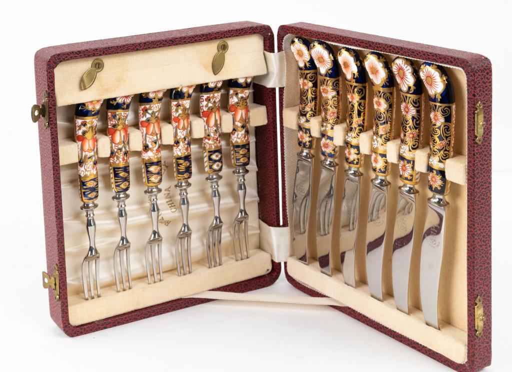 Cased Set Royal Crown Derby Imari Forks & Knives: Cased set of twelve Royal Crown Derby Imari porcelain dessert knives and forks, each with pistol grip handle, comprising six 6 1/4"L forks and six 7"L knives, blades on knives marked "Royal Crown Derb