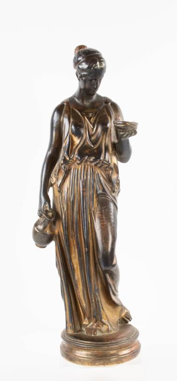 Patinated Metal Renaissance Style Hebe Statue: Late 19th / early 20th century; continental school after Thorwaldsen; full-length figural sculpture depicting Hebe, Greek goddess of youth, wearing a draped garment, holding a water ewer in one hand a
