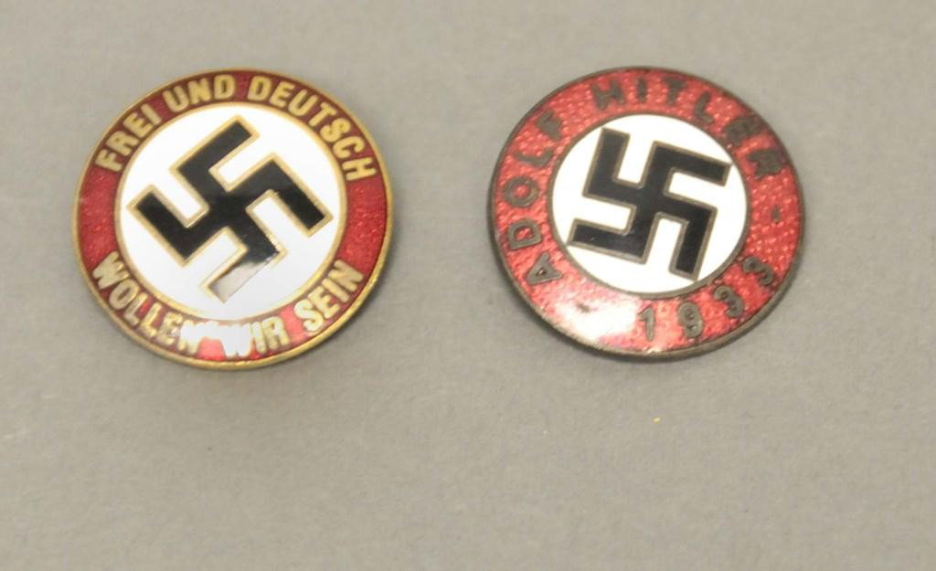 2 German Nazi Enameled Party Badges: 1. German Nazi enameled badge/pinback "Frei Und Deutsch Wollen Wir Sein", marked on back "Ges Gesch"; 2. German Nazi enameled "Adolf Hitler 1933" pin, marked on back "RZM M1/129"