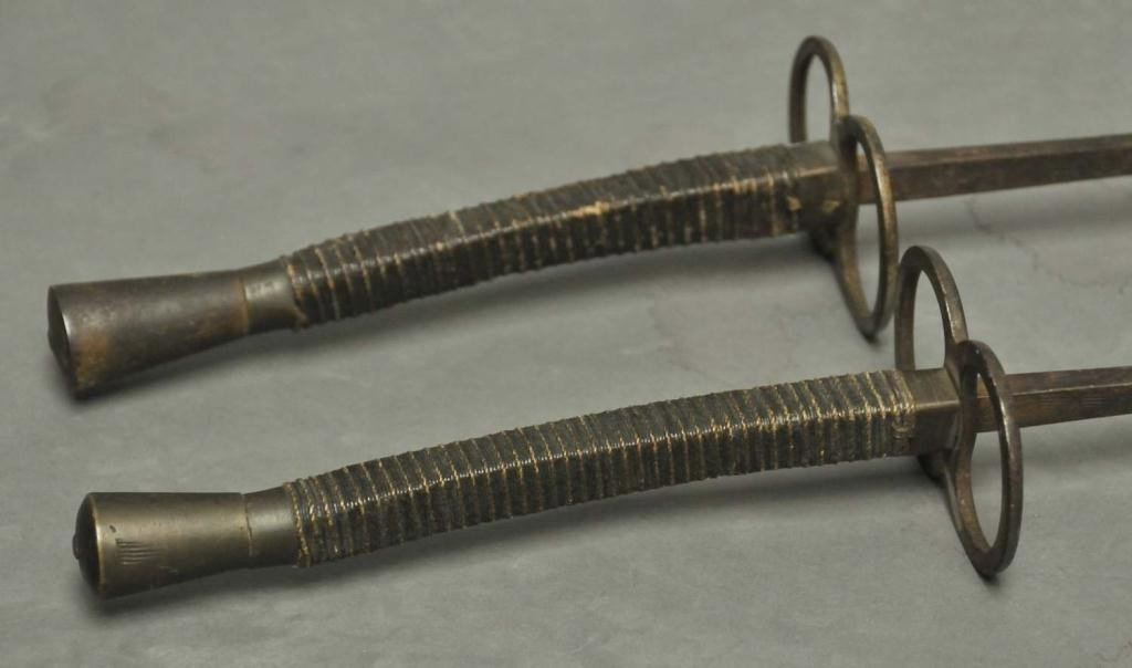 Two Continental Fencing Swords: One blade marked "Felix Grave" and "London", other marked "Paris" with illegible maker; both with figure 8 guards