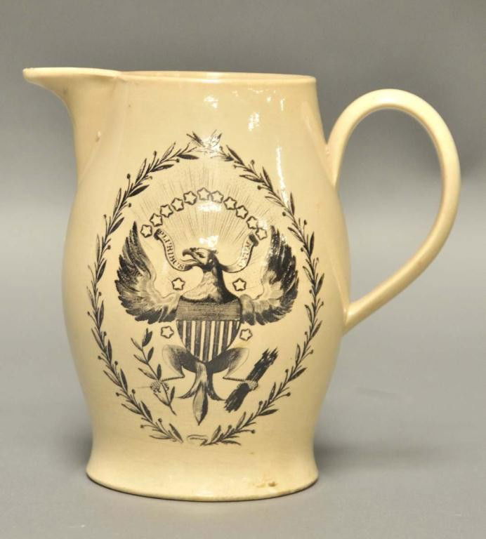 Excellent Liverpool Creamware Pitcher or Jug: c. 1795-1818; one side with black transfer of a three masted sailing ship under full sail, sailors on board, flying a 15-star American flag; other side with black transfer of heraldic eagle with "Plur
