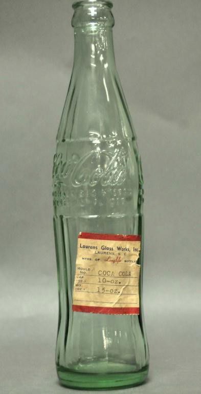 Coca-Cola Proof Bottle from Laurens Glass Works: 10 oz. Coca-Cola proof bottle with original label from the Laurens Glass Works, Inc., Laurens, South Carolina