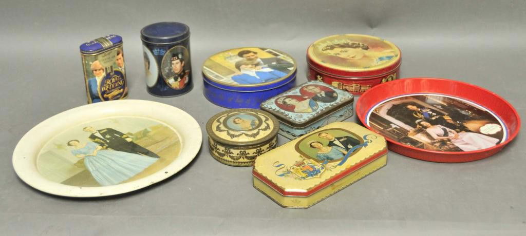 Collection of English Royalty Tins and Trays: Nine tin pieces commemorating British Royalty coronations and weddings; depicting Queen Elizabeth II, Prince Philip, and Charles and Diana; includes candy and biscuit tins, two trays
