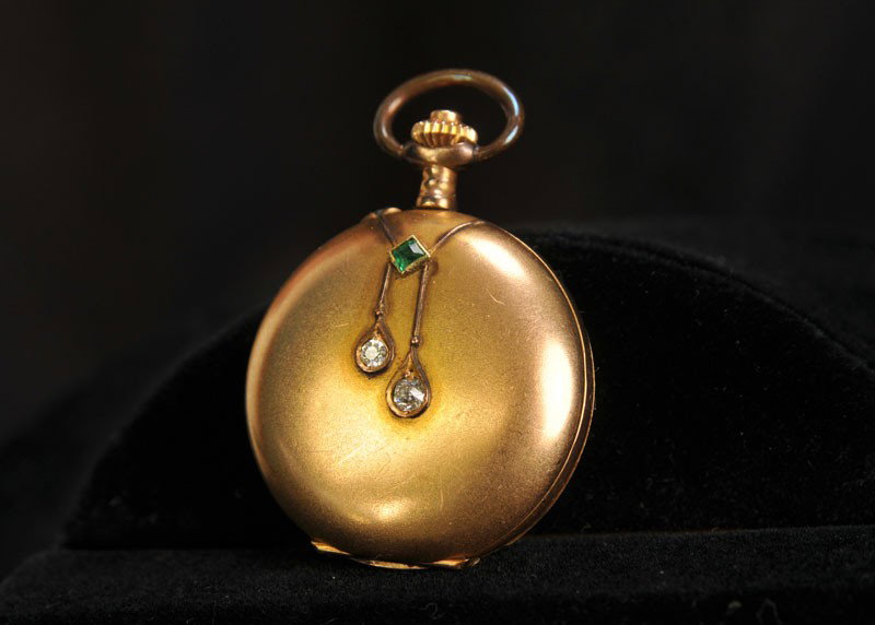 Lady's 14 kt. Gold, Diamond, & Emerald Watch: Vintage lady's pocket watch, one side with applied decoration consisting of a square emerald from which suspend two teardrops each containing a diamond; inside of back marked "0.585" and "118520"; tot