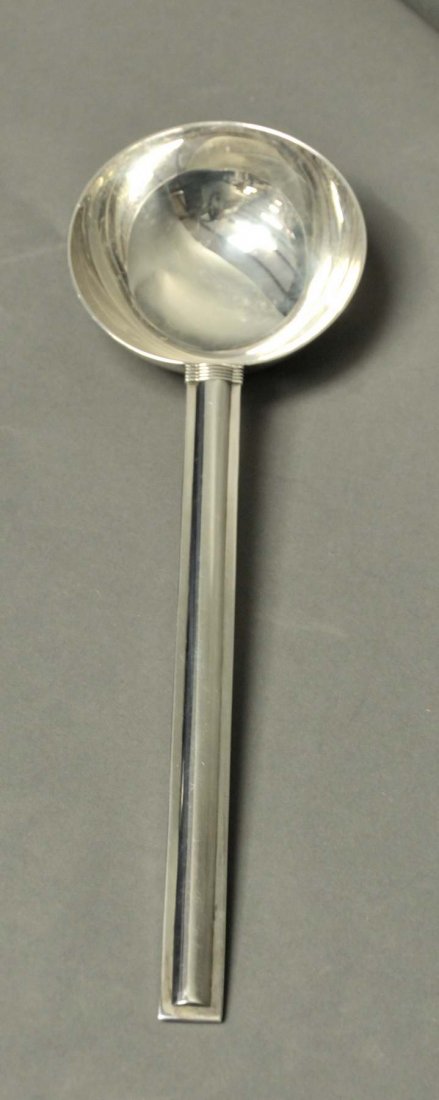 Puiforcat Sterling Ladle, Cannes Pattern: Jean E. Puiforcat (French, 1887-1945) sterling silver ladle in the Cannes pattern, circa 1928; marked "PUIFORCAT-FRANCE" on handle and with penknife between 'EP', (Minerva) in bowl; 11 3/4"L; 7.955 oz
