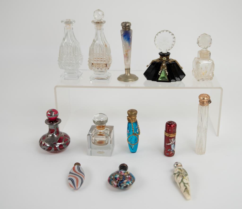 Webb, Chatelaine & Other Perfume Bottles: 13 total bottles: 1. Lay down perfume bottle, attributed to Thomas Webb & Sons, with enameled and gilt cascading floral decoration on a cream ground, sterling mount with maker initials of "CM" (Charle