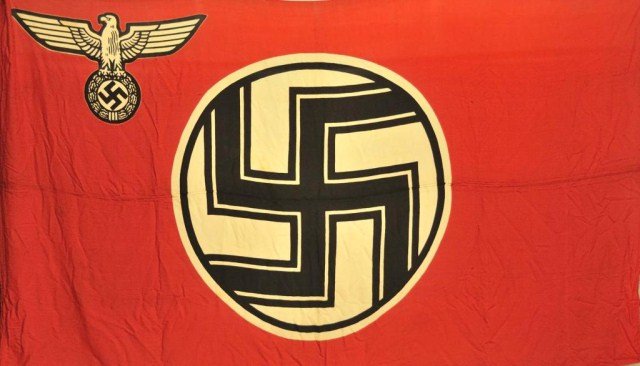 Large WWII German State (Reich) Service Flag: Double sided with center double stitched seam; approximately 120"L, 70 1/2"H; a few small holes, scattered areas of soiling/staining