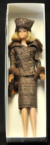 1965 American Girl Barbie "Saturday Matinee": Vintage American Girl Barbie with long blonde hair, wearing "Saturday Matinee" #1615 consisting of brown tweed jacket with fur trim, brown tweed skirt, tweed turban style hat, short brown gloves, gold
