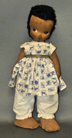 WPA African-American Cloth Doll: c. late 1930s; product of the Works Progress Administration handicraft project which employed women in the manufacture of dolls, toys, textile printing, etc.; molded cloth face with painted features, 