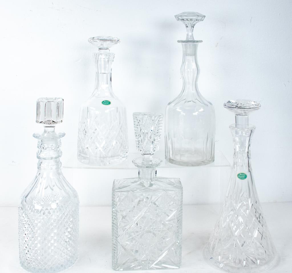 5 Cut Glass Decanters--Stuart Crystal Shaftesbury: 1. Two Stuart Crystal decanters in the Shaftesbury pattern including flask wine decanter and stopper, 11 1/2"H; and wine decanter and stopper; 10 1/4"H; each retains original "Stuart Crystal / Great B