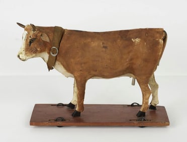 Antique Leather Covered Cow Platform Pull Toy