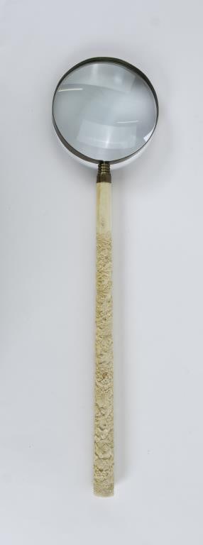 Chinese Magnifying Glass w/ Signed Carved Handle: Brass mounted magnifying glass with signed carved bone handle; 18 3/4"L; good condition ---From the estate of Joseph Ewing, long-time antiques dealer in OH, NC, and SC, to benefit the Laurens County M