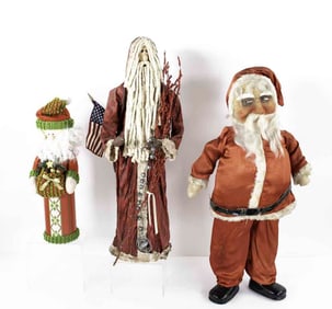 Three Santa Claus Figures