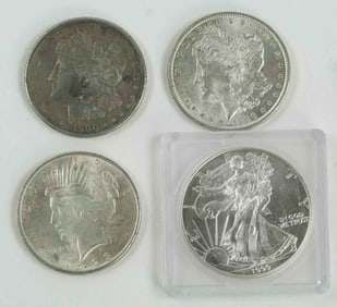 Four U.S. Silver Dollars