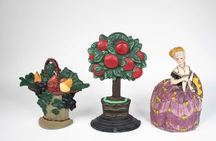 Three Painted Cast Iron Doorstops