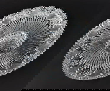 14" Round Tray, American Brilliant Cut Glass: Hobstar center with radiating Prisms reaching to a border of Hobstars alternating with Strawberry Diamonds, scalloped sawtooth rim; 14" dia., 1 1/2"H---surface chip at sawtooth rim extending approxima