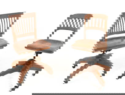 Two Early 20th C. Oak Office Chairs: Both on probably original casters, each with swivel seat and adjustable height, one with old label "Property of Clemson College Extension Service" and seat measuring 18 3/4"W, 18 1/4"D; other with sea