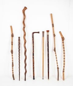 Eight Carved Wood Walking Sticks