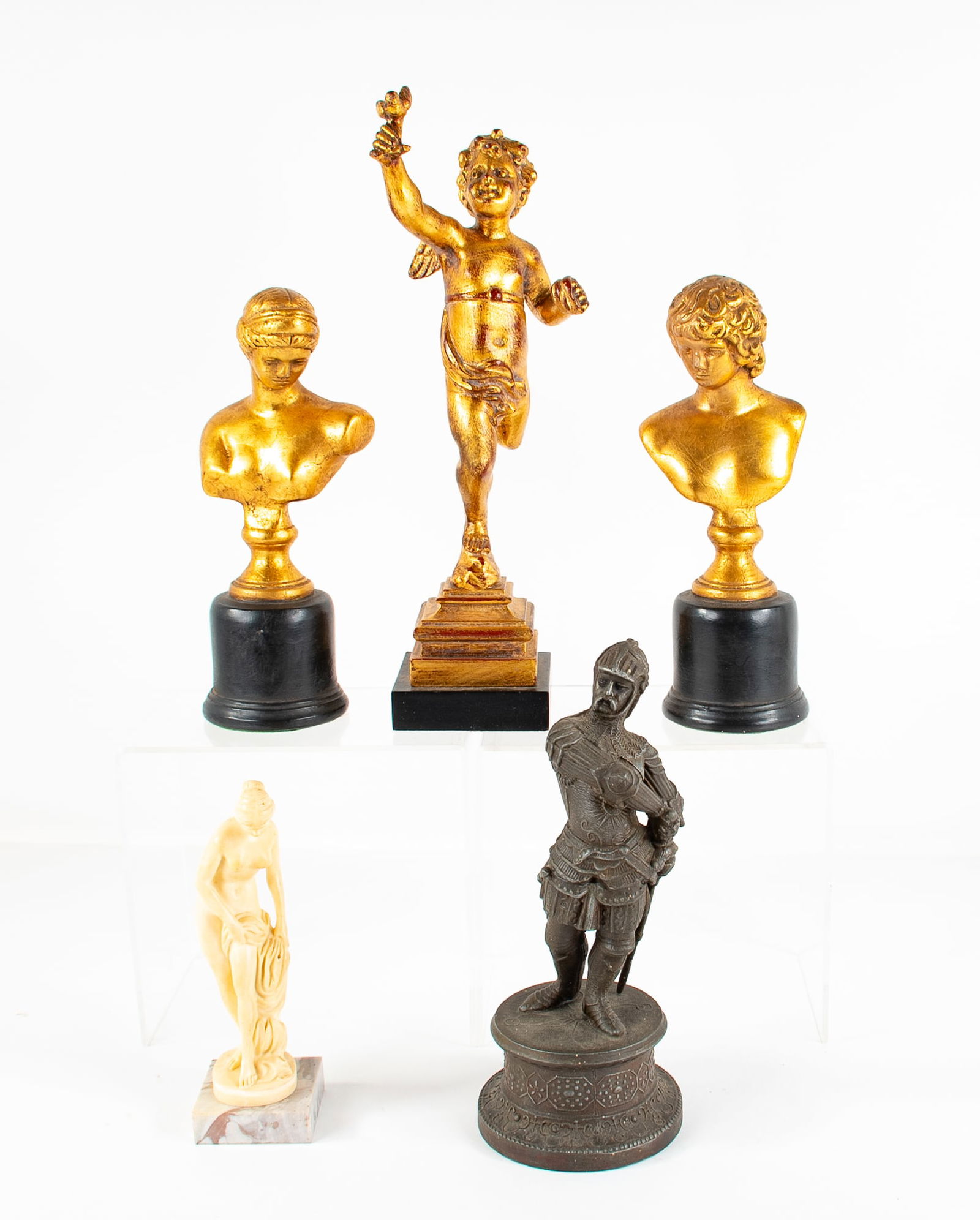 A. Santini, Spelter Knight, Other Statues & Busts: A. Santini, Italian statue of female nude, mounted on marble base; 6 1/4"H---Spelter statue of knight standing on a round plinth; 8 5/8"H---Pair of gilt plaster busts, mounted on black painted plinths
