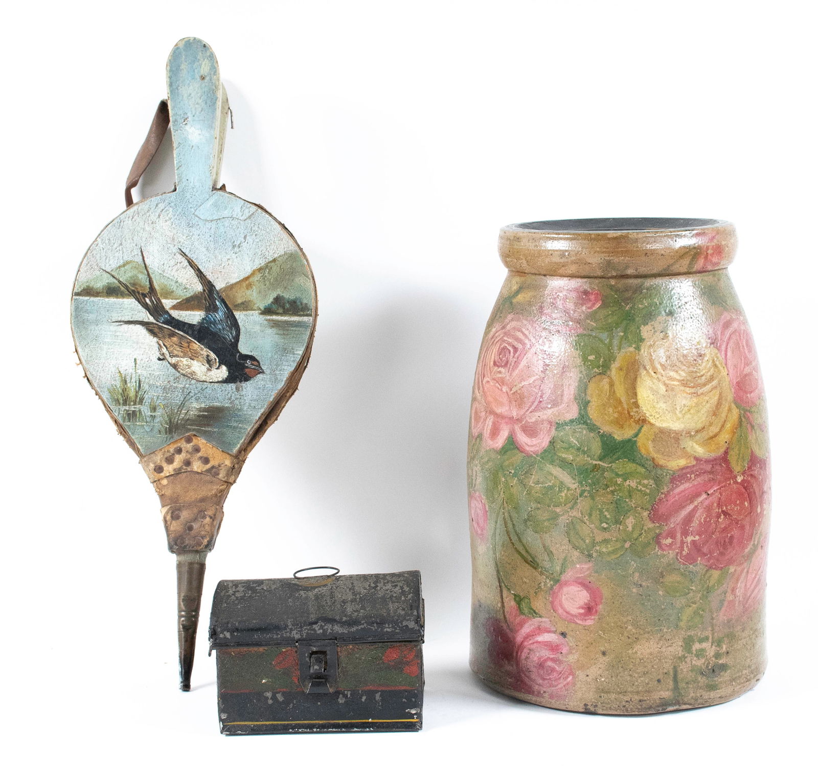 Hand Painted Bellows, Stoneware Jar. Toleware Box: 1. Early wood and leather bellows hand painted with a bird flying over a waterway with mountains in the distance; 14 3/4"L, 5 1/2"W---2. Stoneware jar hand painted with roses overall; 10"H---3. Small