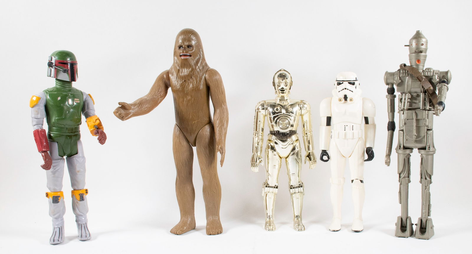 Five Large Size Star Wars Figures: 1. Boba Fett, marked on back "CPG Products Corp. 1979 / By ITS Div. Kenner Products / Cincinnati, Ohio 45202 / Cat. No. 39140 Made in Hong Kong"; 13 1/2"H---2. Chewbacca, marked on back "© G.M.F.G.I.