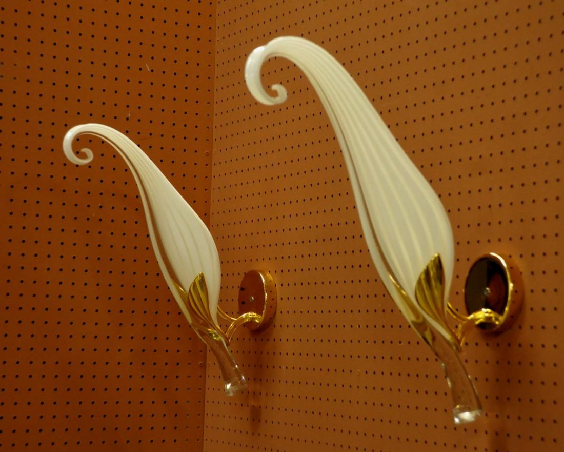 Two Fabbian Italian Murano Glass Sconces: Two large blown glass leaf sconces, unmarked but probably Murano, mounted in brass fixtures, label "f. fabbian Made in Italy" on back; approximately 23"H, 7"W and 24"H, 6 1/2"W--Proceeds to benefit Ho