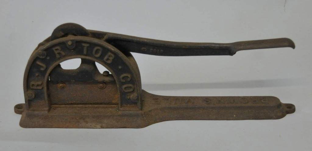 Cast Iron "Brown's Mule" Tobacco Cutter: Cast iron R.J.R. Tob. Co. Brown's Mule tobacco cutter; embossed on the lever "3 3019", on the side mount arch "R.J.R. Tob. Co.", on the base bar "Brown's Mule" with measuring scale marked "1 inch 2 in