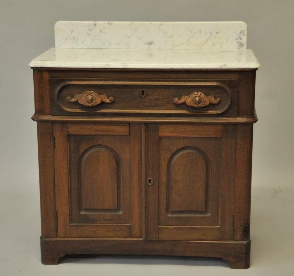 Renaissance Revival Walnut Cabinet w/ Marble Top: c. 1850-60, one drawer over two arched panel doors, marble top and backsplash possibly later; 30 1/2"W, 15 1/2"D, 33"H--From the estate of Thomas A. Gandy, Society Hill, SC