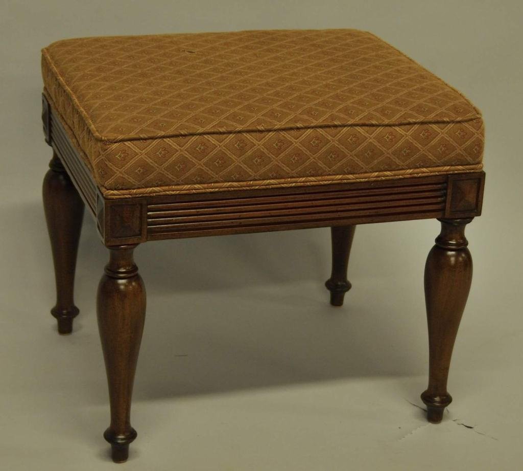 Maitland Smith Carved and Upholstered Bench: Mahogany with turned legs, 20th century; 21 1/2" x 19", 20"H; small tear to upholstery