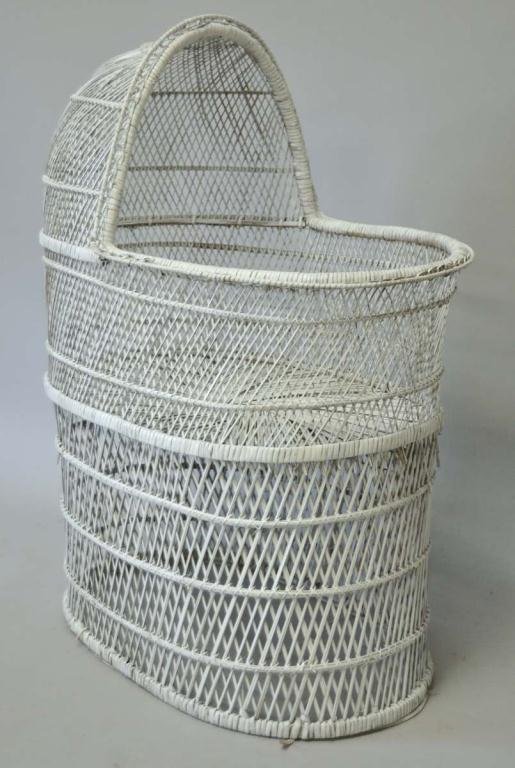 White Wicker Bassinet: 22" x 33", 43"H; minor losses