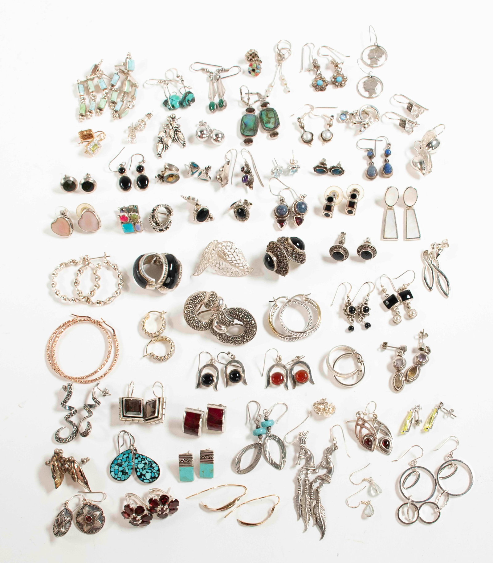 64 Pairs of Sterling Pierced Earrings: All marked "925" or "Sterling", various marks and settings---total weight 10.18 ozt