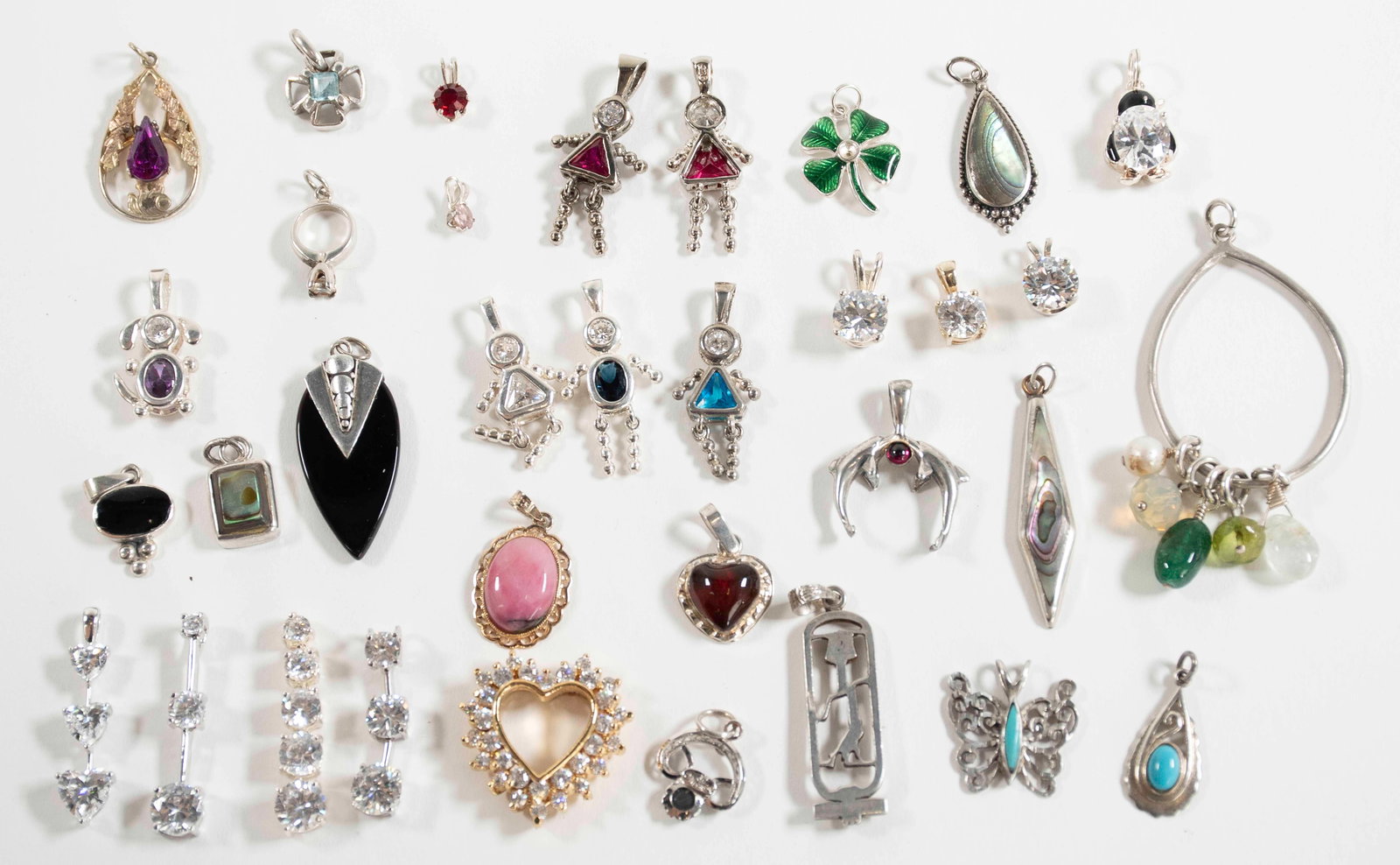 34 Sterling Silver Pendants: All marked "925", "Sterling" or with hallmark; various settings; largest 2 1/4"L---total weight 2.27 ozt (Inv. SJ-14)