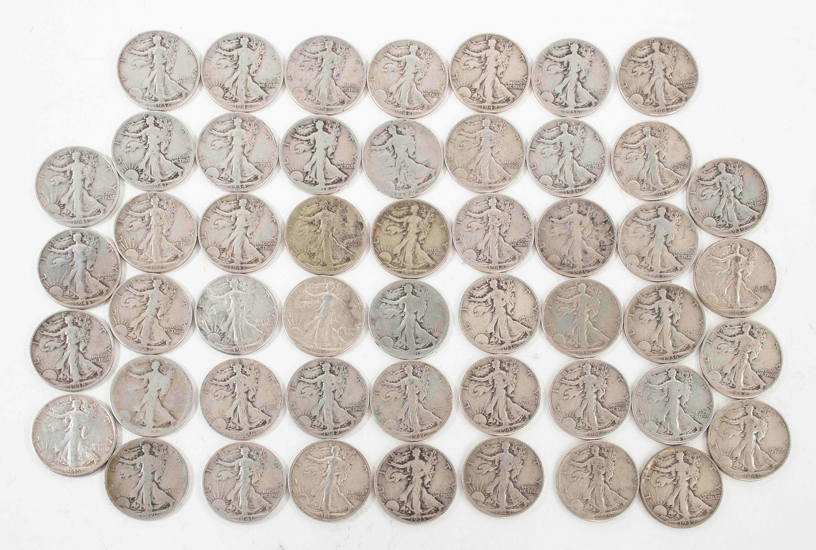 50 Walking Liberty Half Dollars: (3) 1918-S (all with worn dates); (1) 1920 (worn date); (1) 1920-S (worn date); (1) 1934; (1) 1934-S; (1) 1935; (5) 1936; (2) 1936-S; (2) 1937; (1)1938; (2) 1939; (3) 1941; (1) 1941-S; (1) 1941-D;