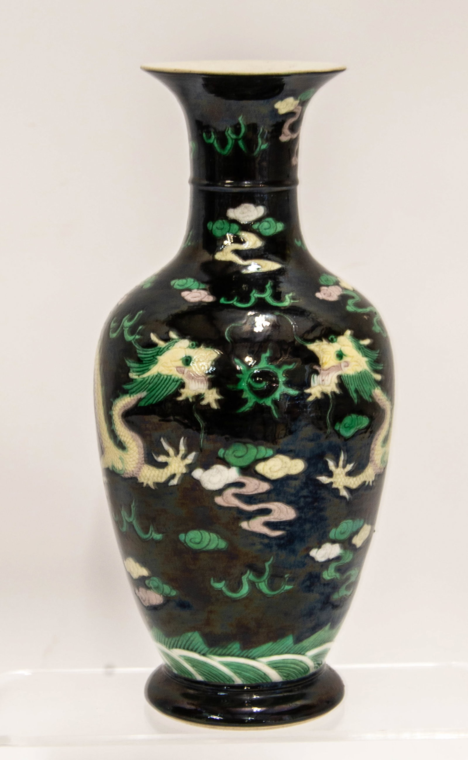 Chinese Famille Noire Porcelain Vase: Qualifies for in-house shipping---Black ground with two yellow dragons with five claws chasing a green flaming pearl, unmarked; 9 1/2"H; good condition---From the estate of Dr. Anthony Lenti and the l
