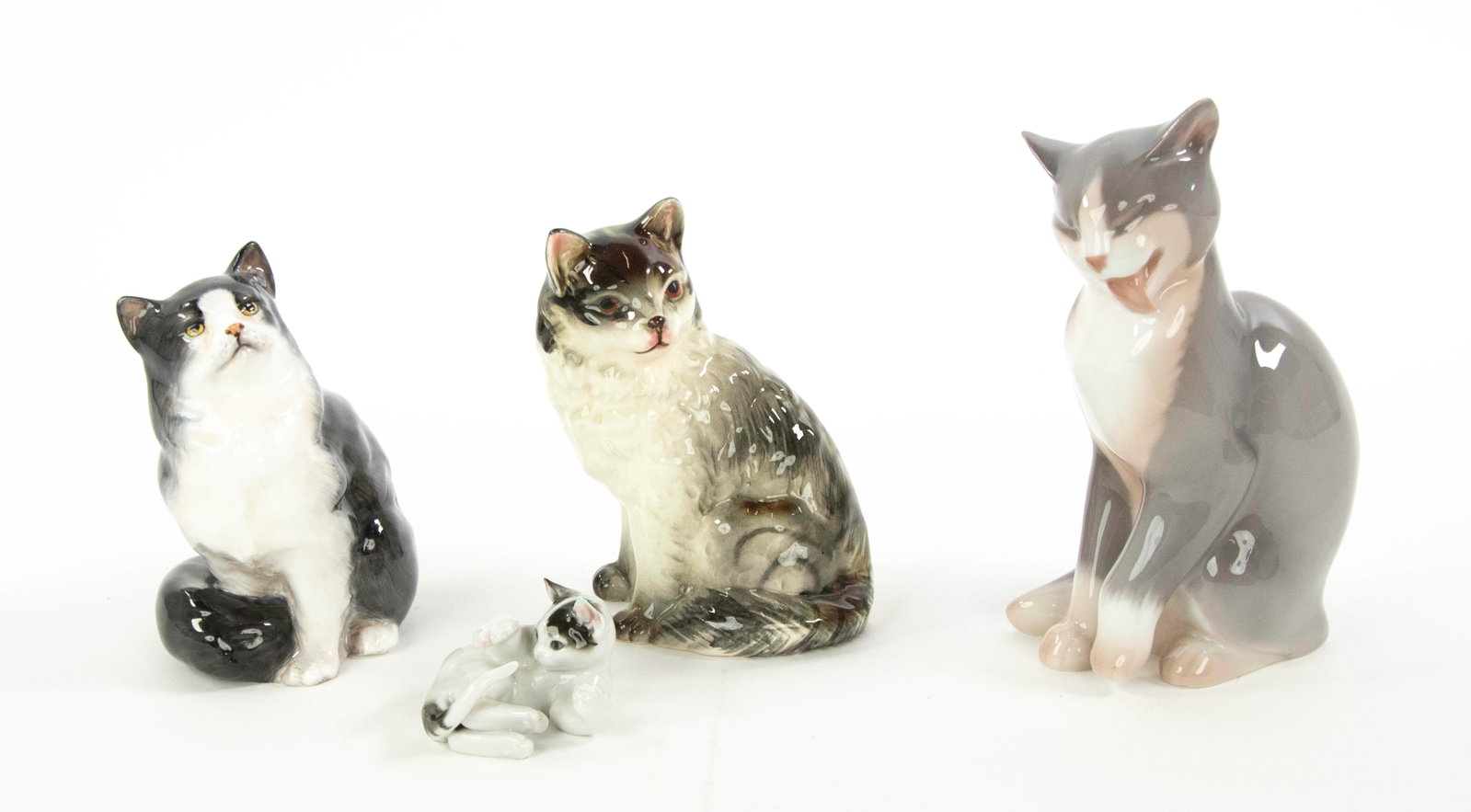 Four Porcelain Cat Figures (1 of 7)