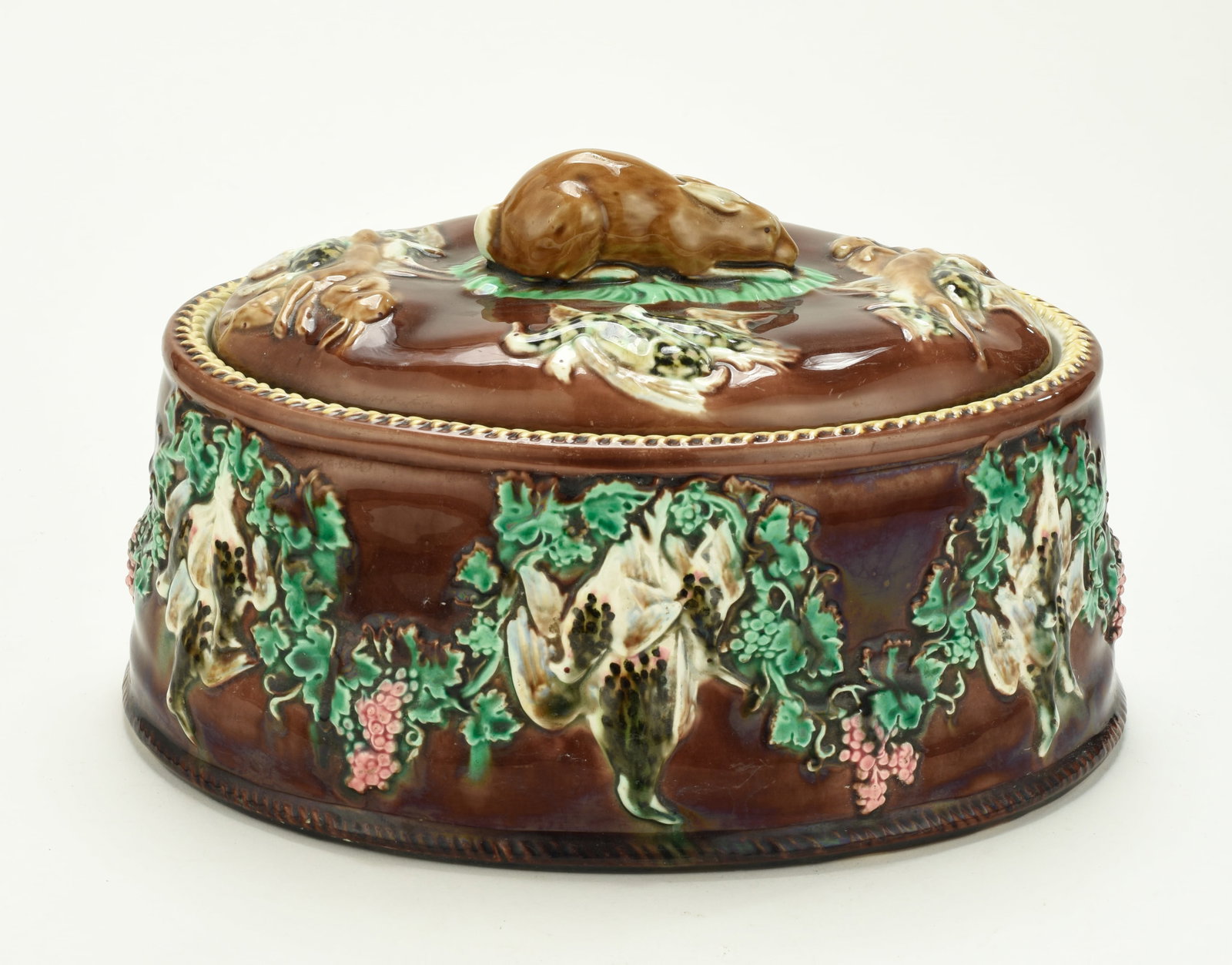 3-Pc. Wedgwood Majolica Game Pie Dish: Qualifies for in-house shipping---c. 1870, composed of two-piece server with original insert, two-piece server with a brown glazed ground, cover with rabbit finial and other game in molded relief,