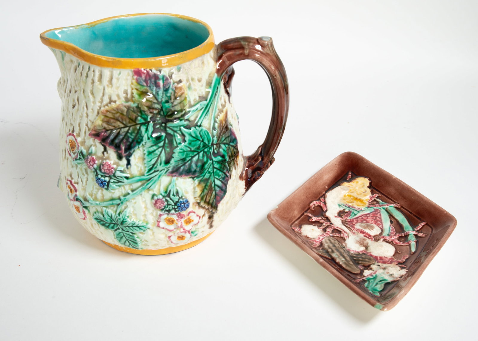 Wedgwood Majolica Blackberry Pitcher & Small Dish: Qualifies for in-house shipping---Pitcher with a bark-like texture and relief-molded blackberries and brambles motif, turquoise interior, base with impressed "Wedgwood" stamp and handwritten "K