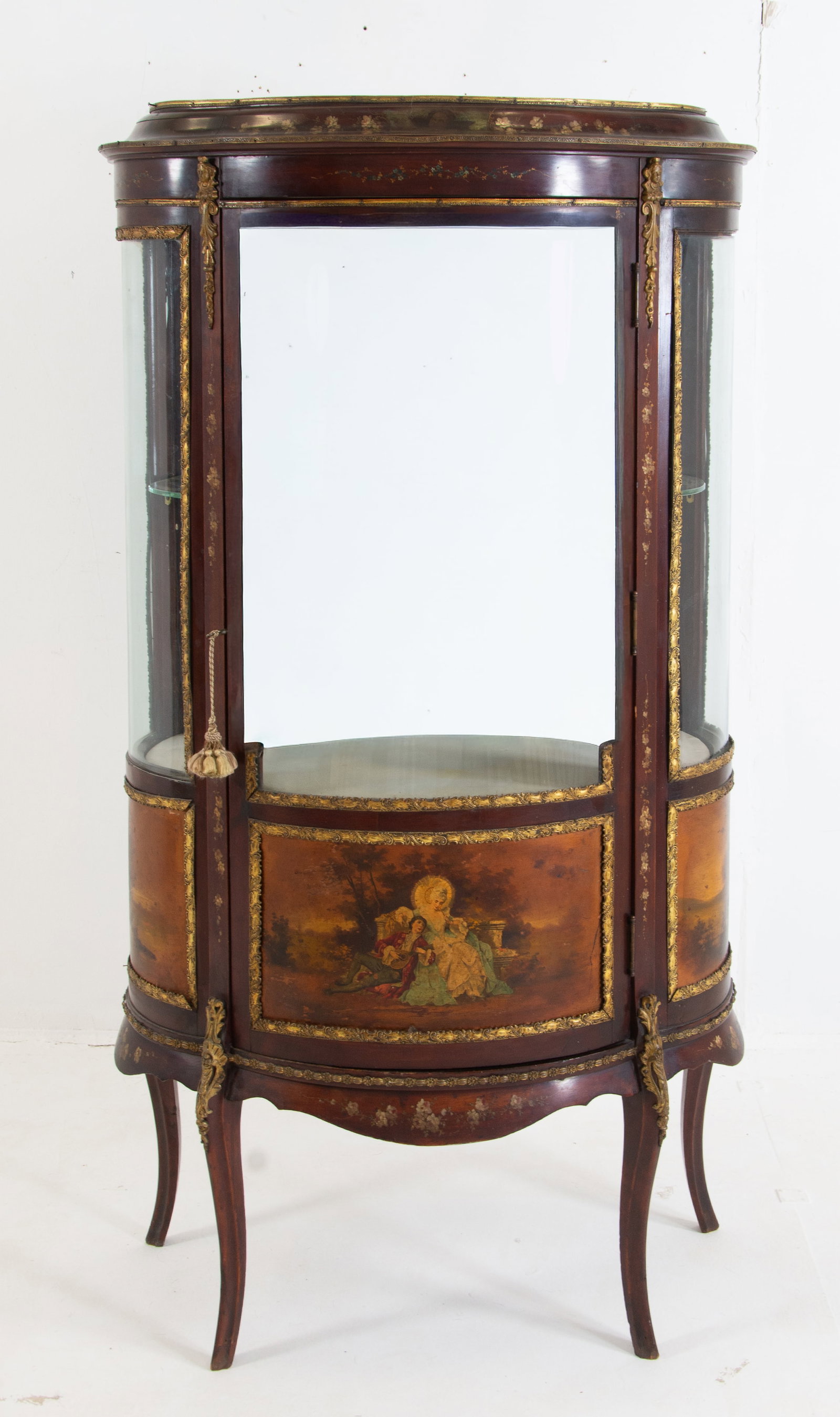 Louis XV Style Vernis Martin Vitrine: Late 19th / early 20th century, door and sides with curved glass over painted courtship and landscape scenes; crest, frieze, stiles and skirt with hand painted floral decoration; overall gilt metal