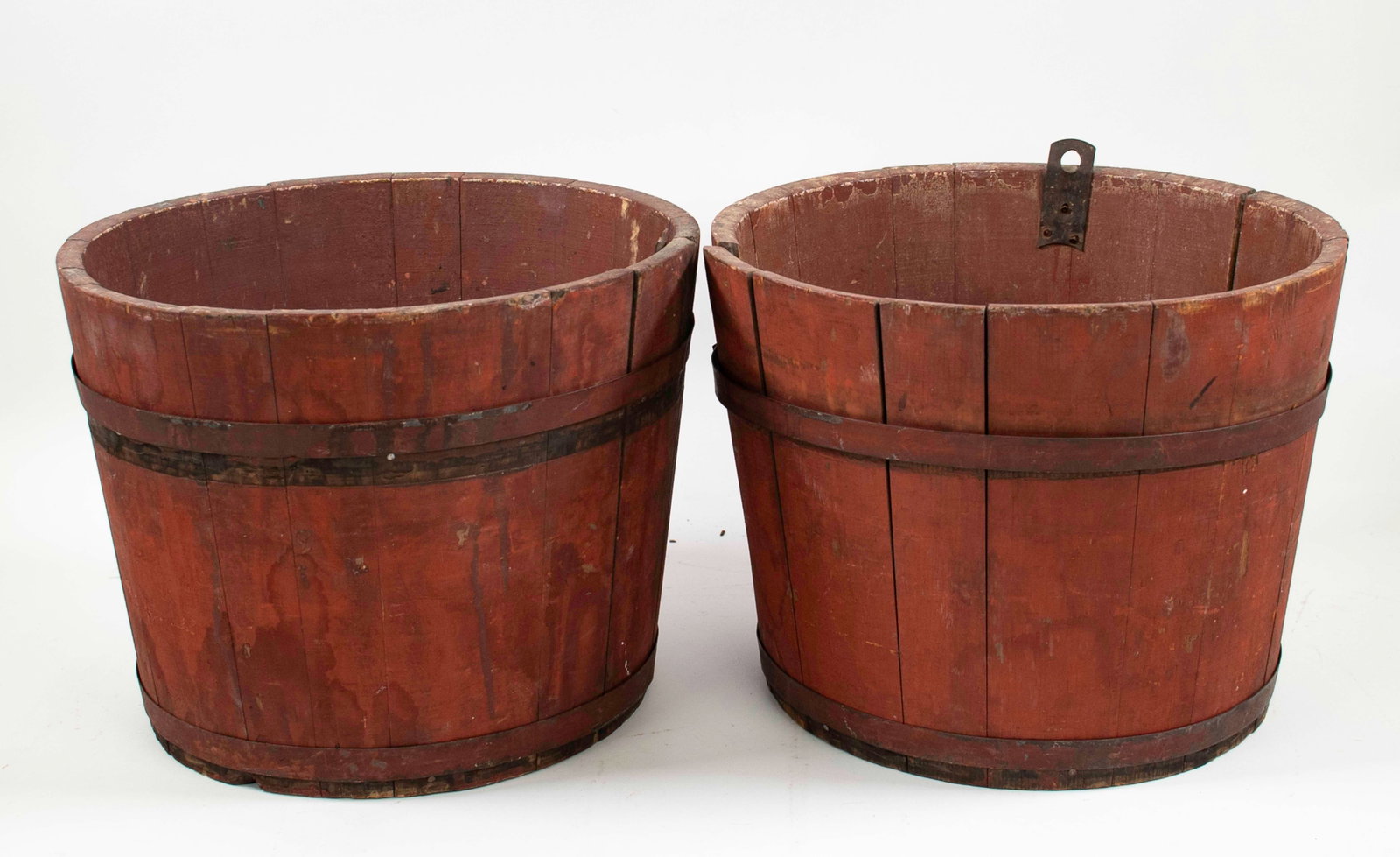 Two Red-Painted Wooden Sap Buckets: Qualifies for in-house shipping---Late 19th / early 20th century, each with two metal bands; approx. 12" top dia., 9"H---normal signs of wear from age and use (Inv. 2)