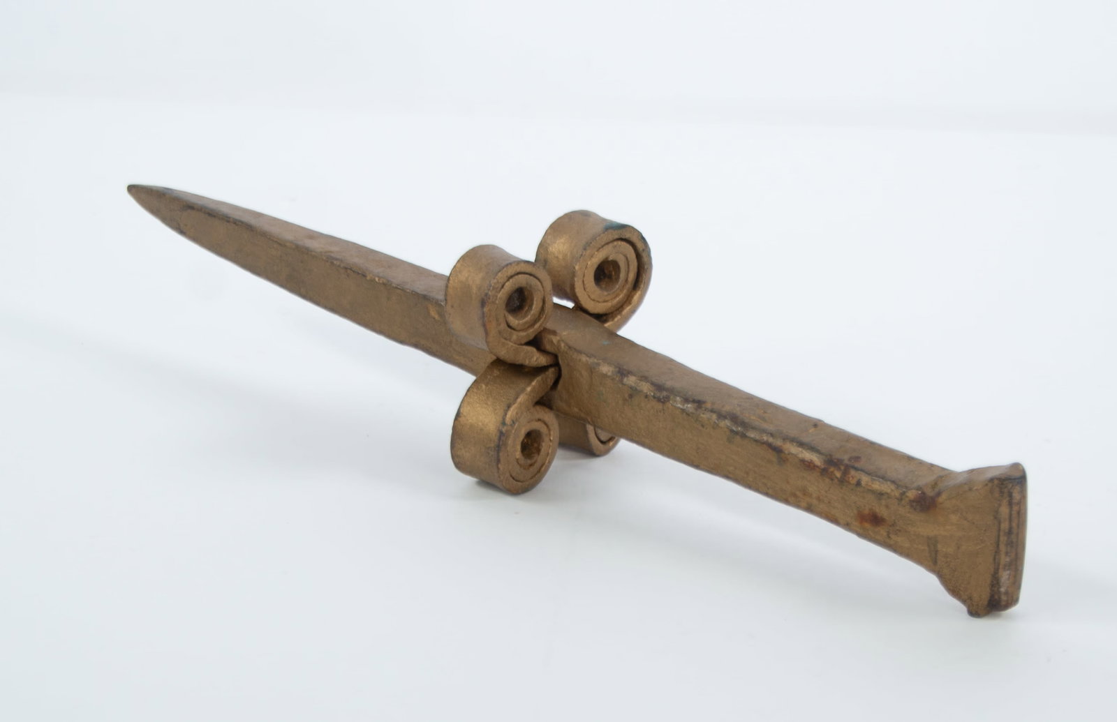 Early Hand Forged Iron Denglestock: Qualifies for in-house shipping---Hand forged stake type denglestock with wrought iron stop, probably late 18th / early 19th century; 14 1/2"L; painted gold (Inv. 11)