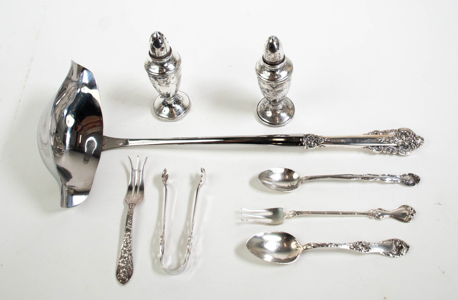 Lot of Sterling Silver Flatware & Tableware: Qualifies for in-house shipping---Eight pieces, no monogram unless noted, comprising: Punch ladle with double spouts and sterling handle in Grande Baroque by Wallace; 13 1/2"L---5 7/8"L olive / pickle