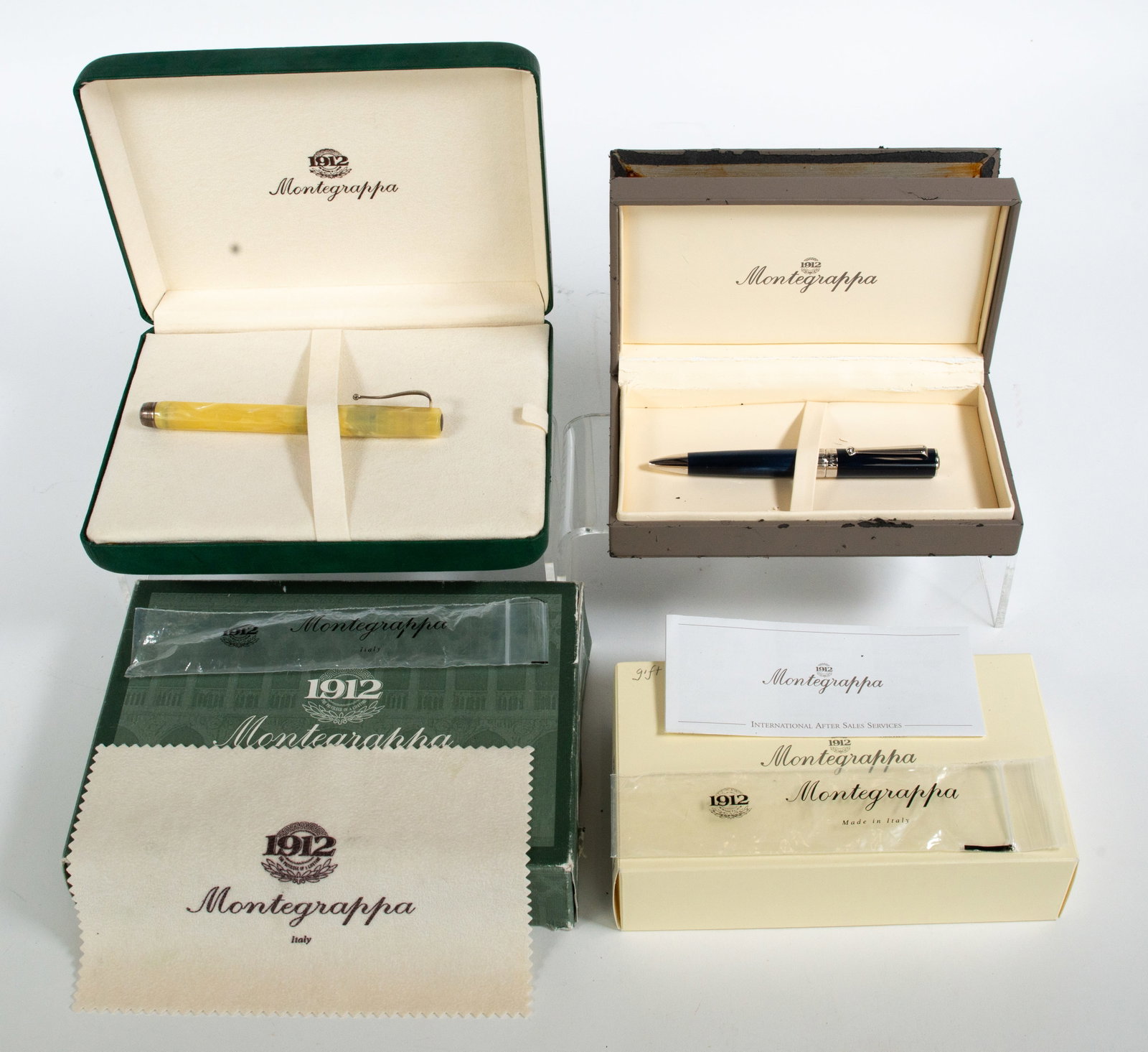 Montegrappa 1912 Fountain Pen & Ballpoint Pen: Qualifies for in-house shipping---Italian Montegrappa fountain pen with yellow octagonal celluloid case; 5 1/2"L, in original box---Italian Montegrappa Espressione ballpoint pen in sterling silver
