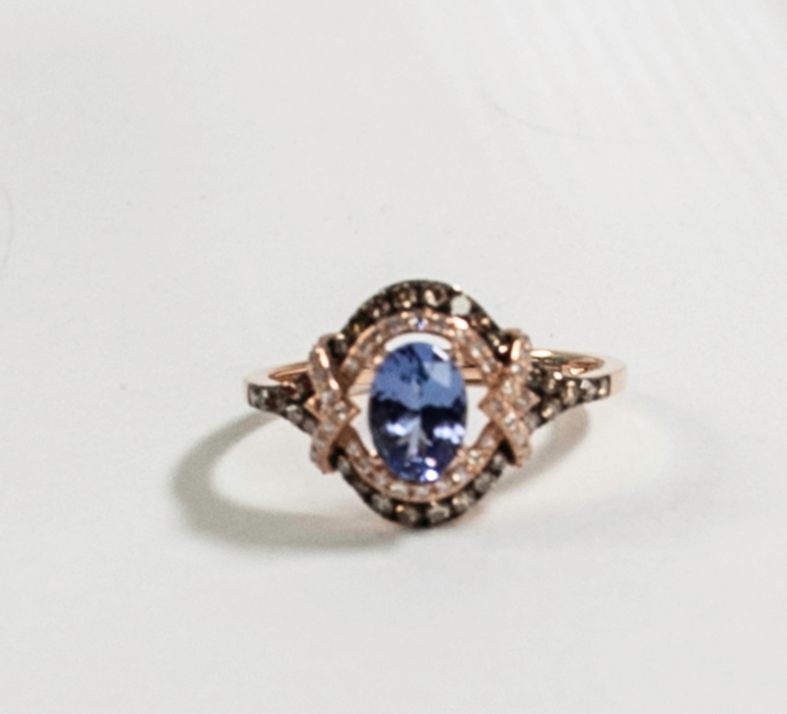 Effy 14K Gold, Tanzanite Royale & Diamond Ring: Qualifies for in-house shipping---Effy (American, founded 1979 -); lady's 14K yellow gold, blue-violet Tanzanite Royale and diamond ring; approx. 4 1/2mm x 7mm blue-violet Tanzanite Royale at center