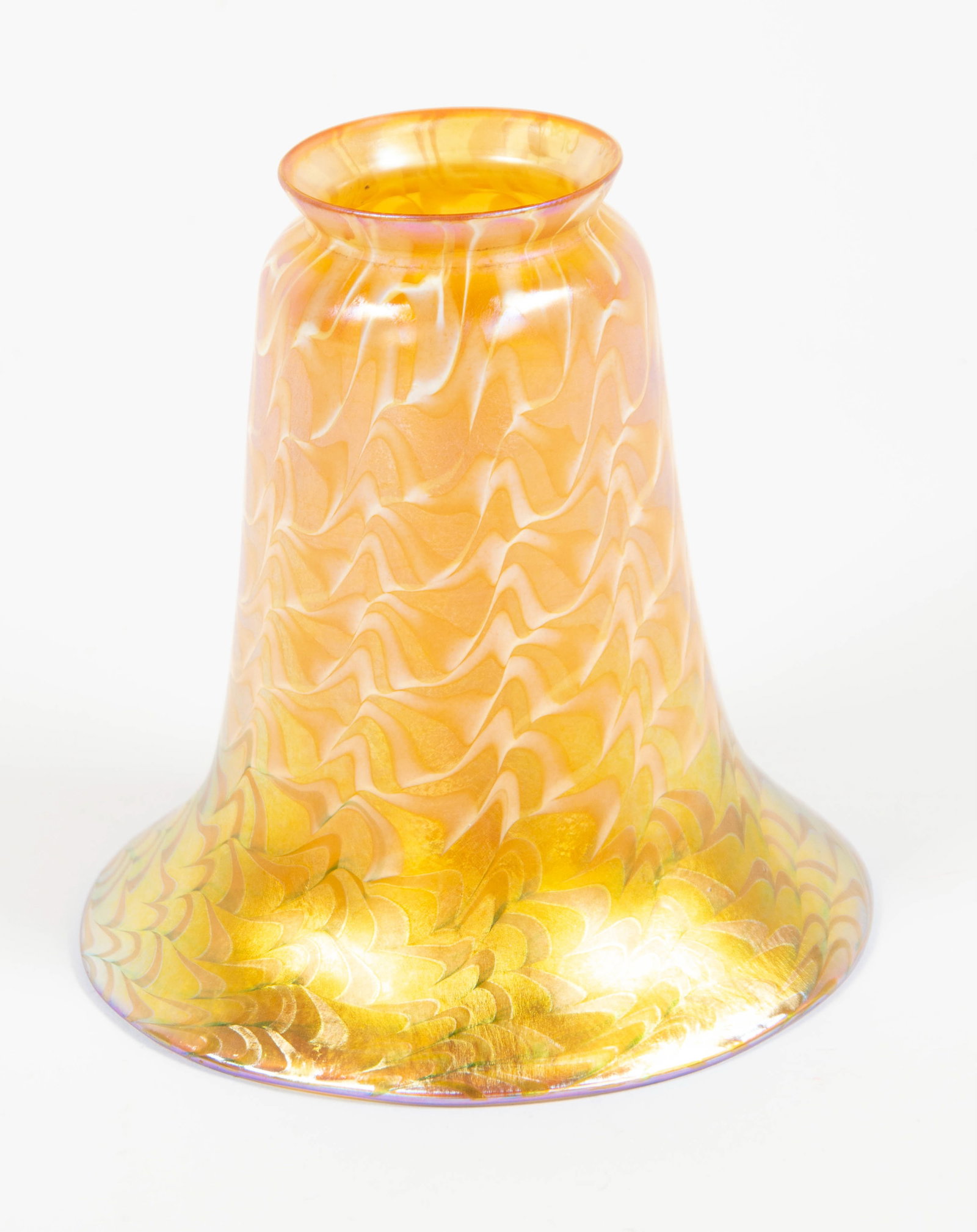 Lustre Art Glass Co. Decorated Glass Shade: Qualifies for in-house shipping---Gold iridescent trumpet form shade with white pulled zigzag pattern, iridescent gold interior, signed on interior of fitter rim "Lustre Art", early 20th century; appr