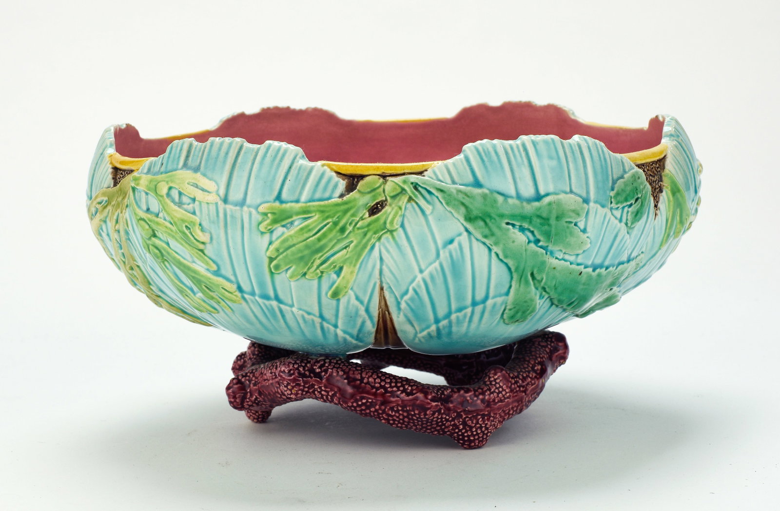 Victoria Pottery Co. Majolica Seafood Serving Bowl: Qualifies for in-house shipping---Decorated with turquoise oyster shells and green seaweed, deep pink interior, rising on a stand of pinkish-brown coral, unmarked; 9"W, 4 3/4"H; good condition---REF: