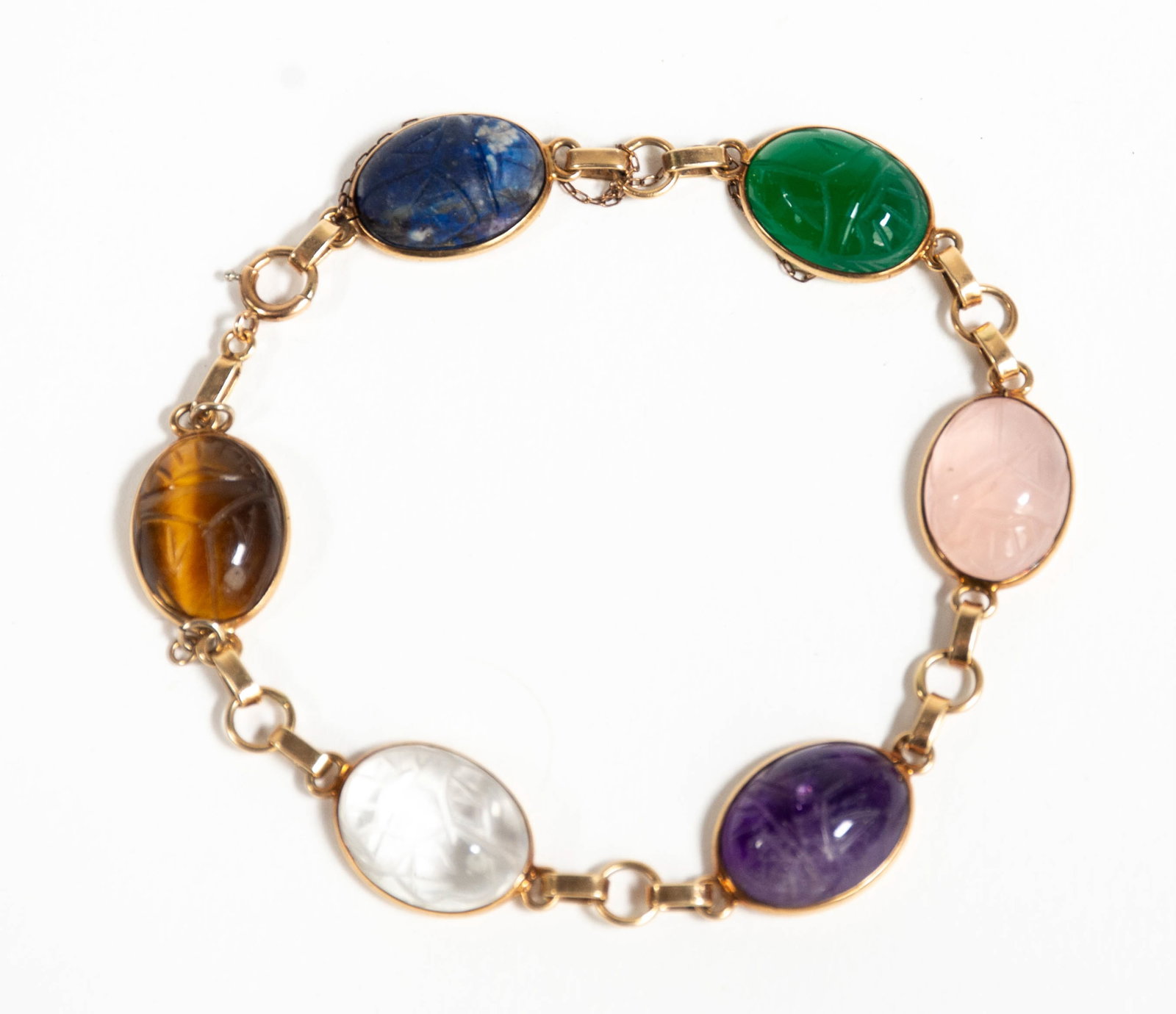 14kt YG and Incised Hardstone Scarab Bracelet: Qualifies for in-house shipping---14kt yellow gold bracelet with six carved hardstone scarabs, marked "14K"; approx. 8"L; safety chain detached on one end---total weight 14.85 grams (Inv. 6-1)