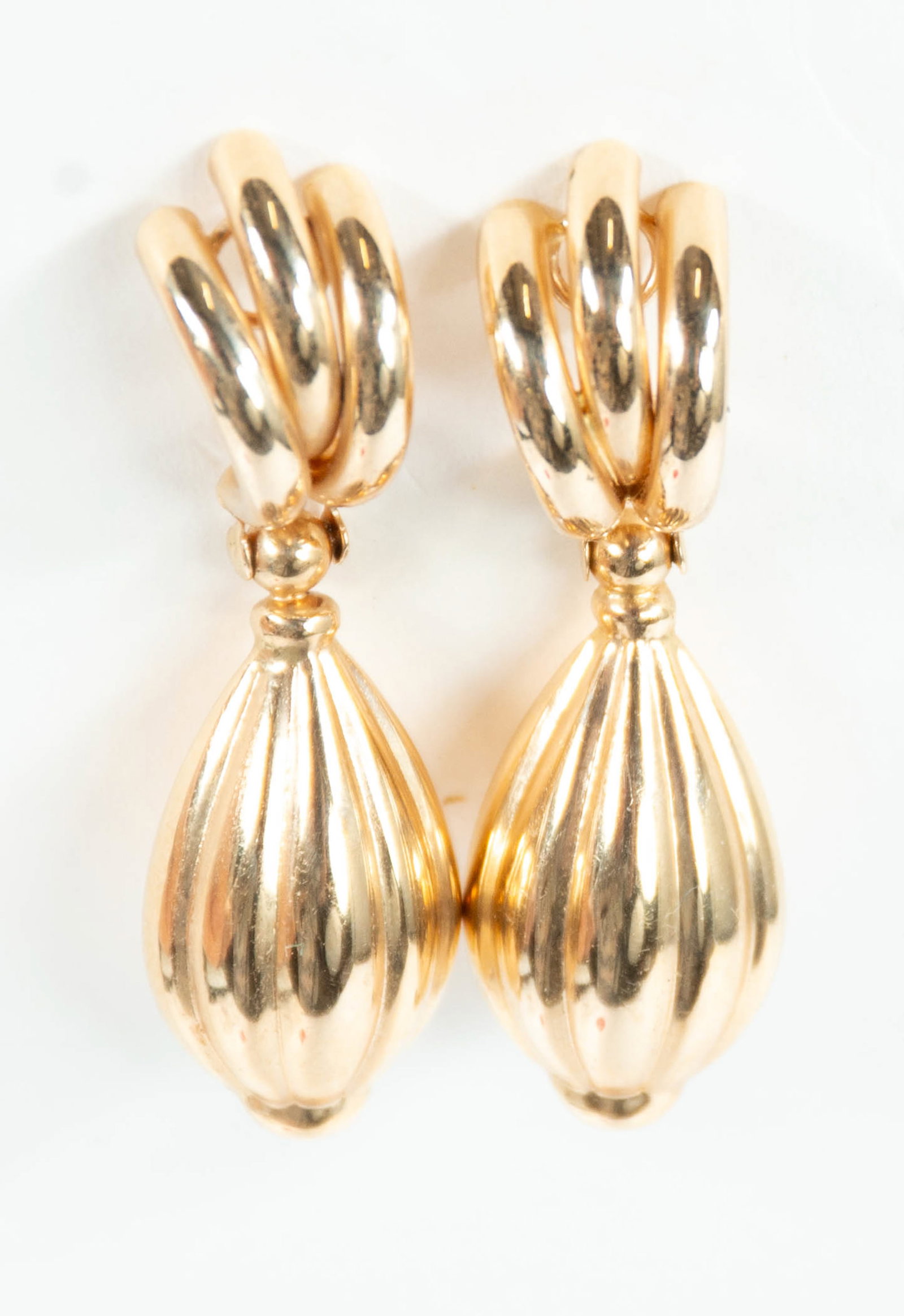 Pair of 14kt Yellow Gold Earrings: Qualifies for in-house shipping---Pierced earrings with a reeded or lobed teardrop dangle, marked "14K"; approx. 1 1/2"L---total weight 4.26 grams (Inv. 9)