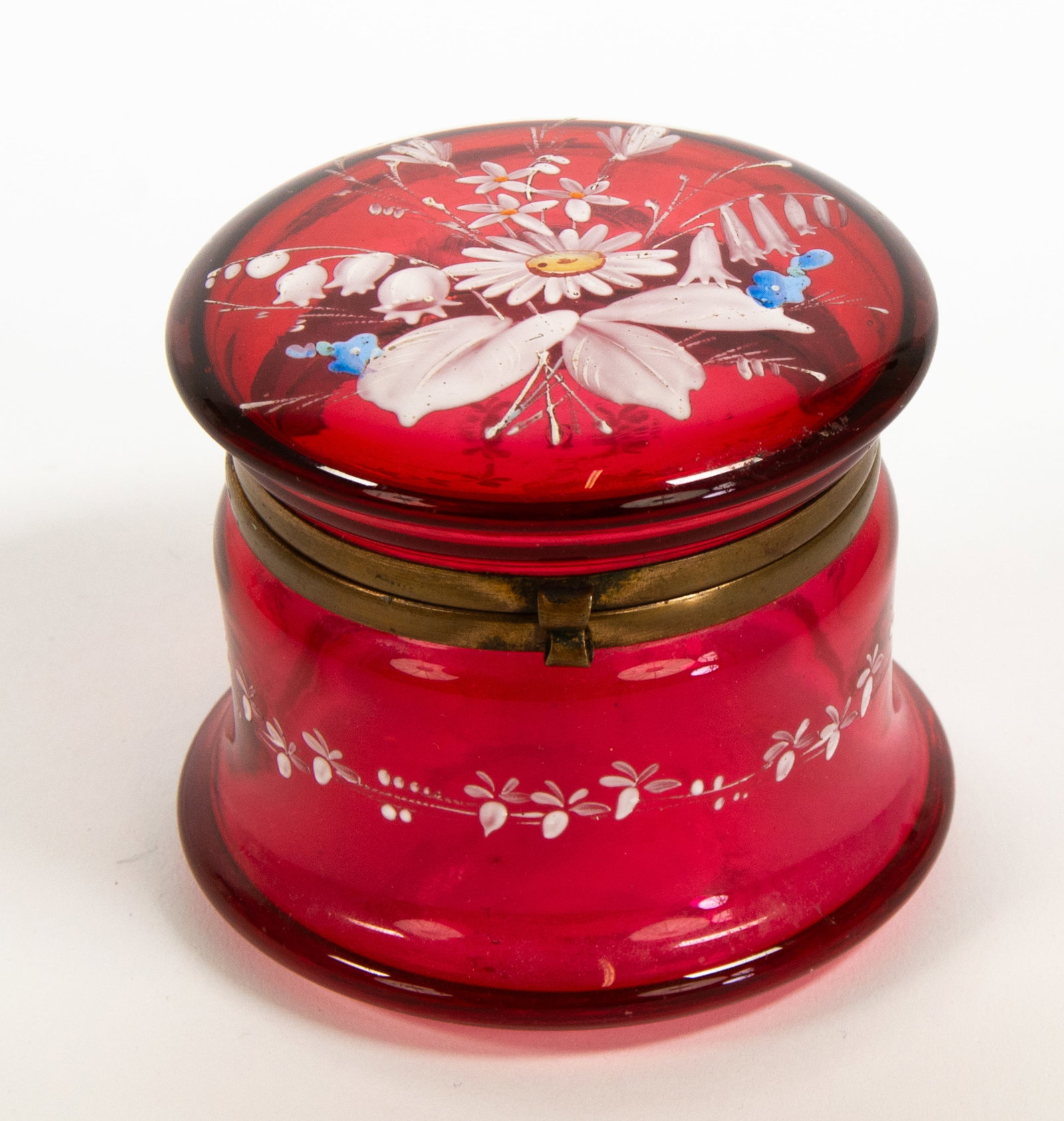 Enamel Decorated Cranberry Glass Dresser Jar: Qualifies for in-house shipping---Cranberry glass jar having a gilt-brass mounted hinged glass lid with polychrome enamel floral decoration, a band of white floral decoration encircles the body of
