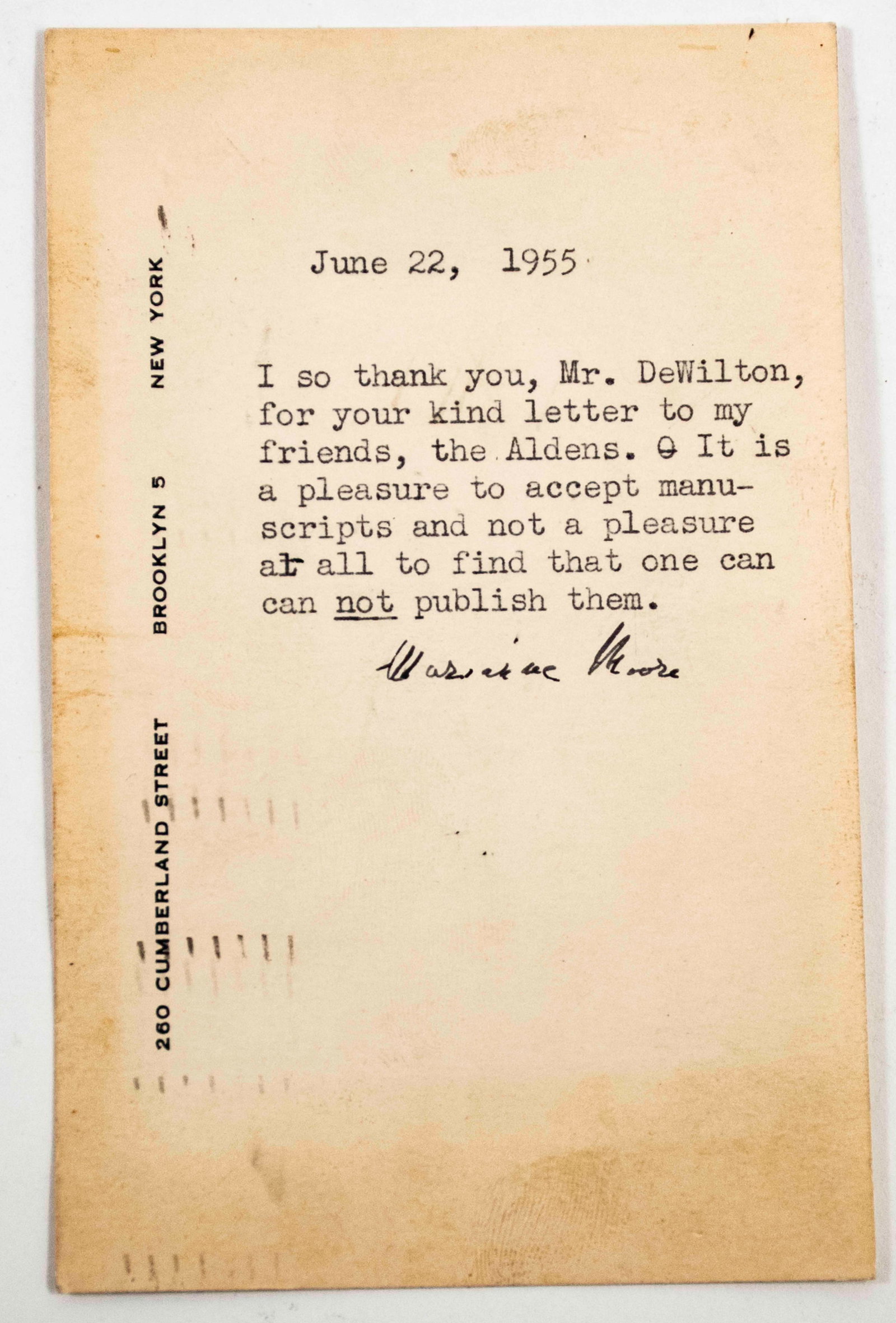 Marianne Moore Signed Typed Postcard: Qualifies for in-house shipping---Marianne Moore (1887-1972), American poet, editor, and critic; 3 1/2" x 5 1/2" stamped postcard addressed to Mr. R. L. DeWilton, The Macmillan Company, New York; date