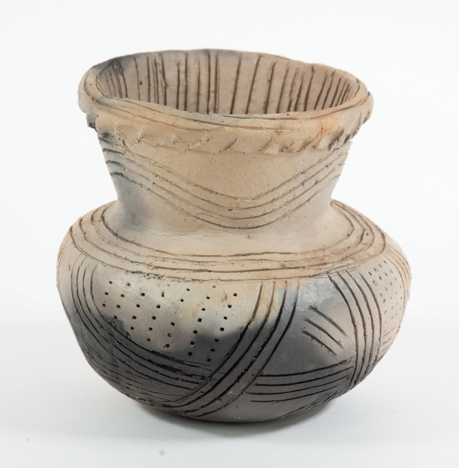 Catawba Native American Pottery Water Jug or Vase: Qualifies for in-house shipping---Molded crimped rim and overall incised decoration including on the inside of rim and neck; 6"H, 6 1/4"W; good condition (Inv.. 2-1)